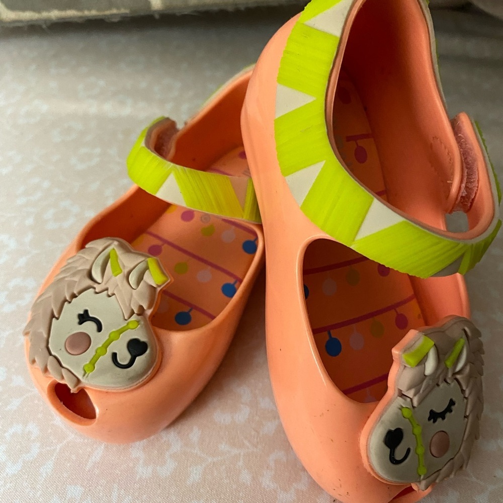 Mini Melissa shoes. Size 5. Color orange.